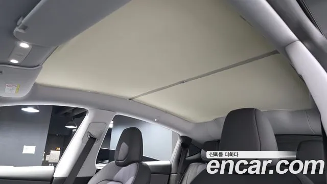 Tesla Model Y — Фото автомобиля 16