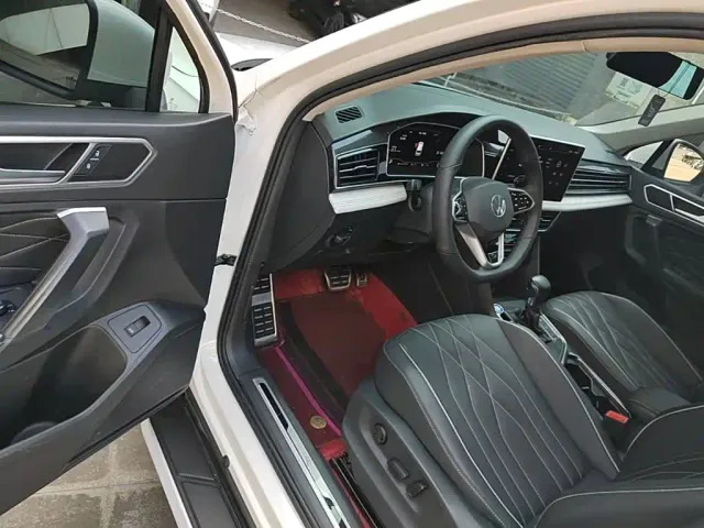 Volkswagen Tiguan L — Фото автомобиля 15