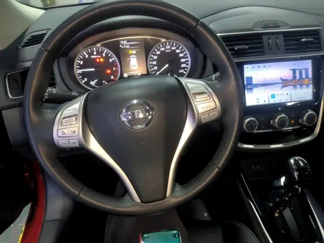 Nissan Tiida — Фото автомобиля 9
