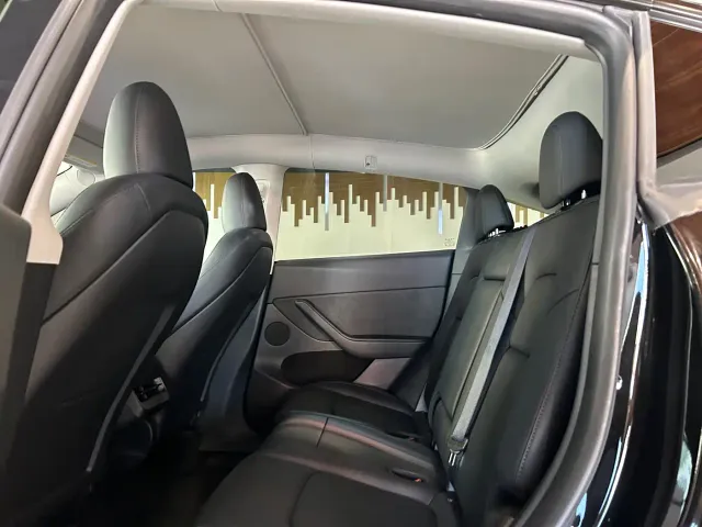 Tesla Model Y — Фото автомобиля 18