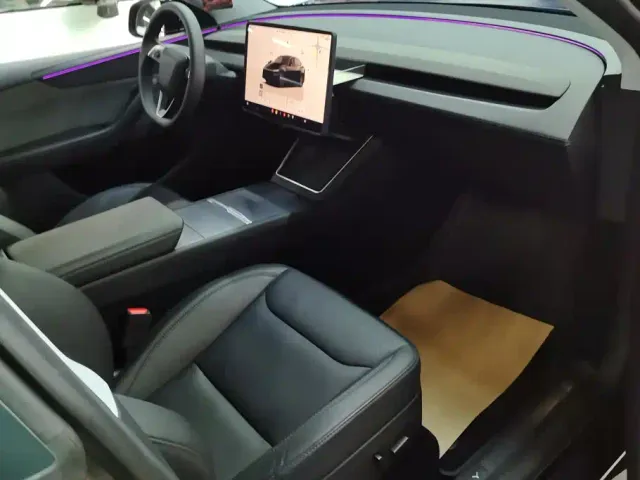 Tesla Model Y — Фото автомобиля 8