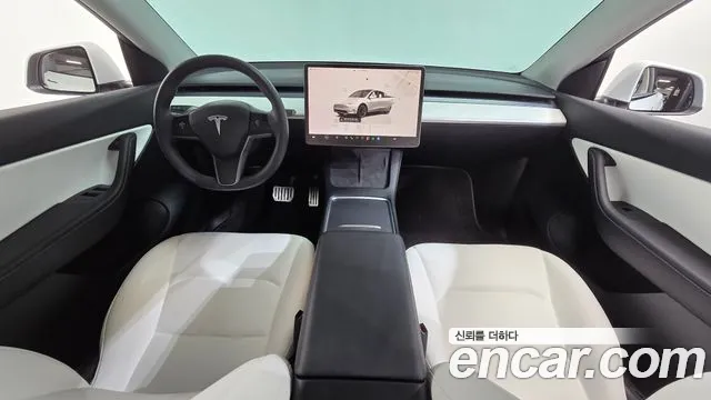 Tesla Model Y — Фото автомобиля 10