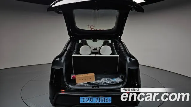 Tesla Model Y — Фото автомобиля 19