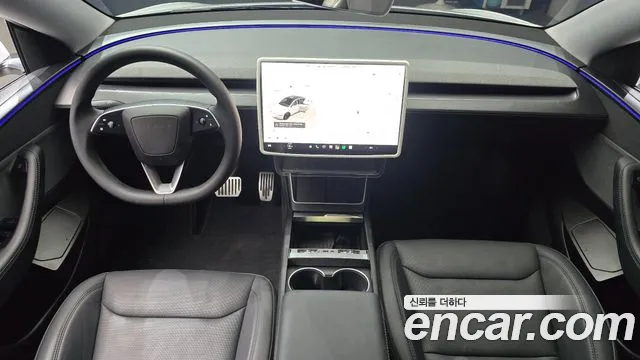 Tesla Model Y — Фото автомобиля 7