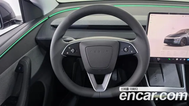 Tesla Model Y — Фото автомобиля 19