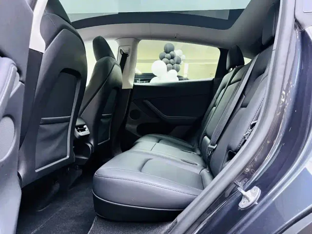 Tesla Model Y — Фото автомобиля 14