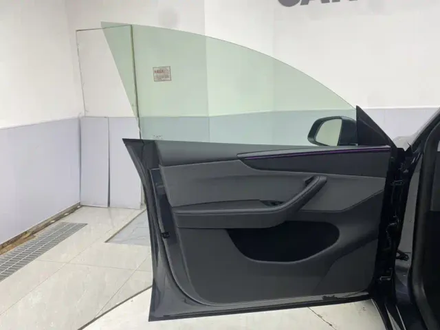 Tesla Model Y — Фото автомобиля 16