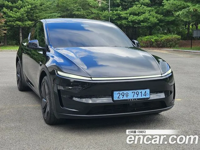 Tesla Model Y — Фото автомобиля 2