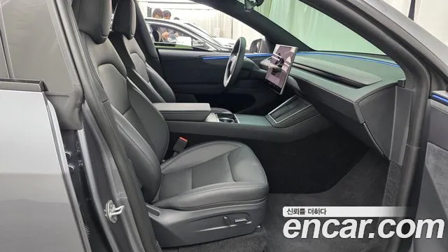 Tesla Model Y — Фото автомобиля 16