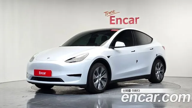 Tesla Model Y — Фото автомобиля 8
