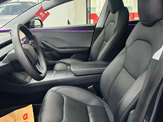 Tesla Model 3 — Фото автомобиля 7