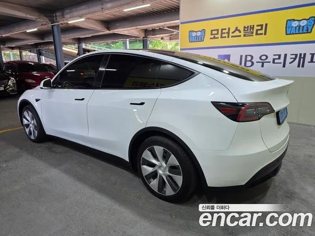 Tesla Model Y — Фото автомобиля 4