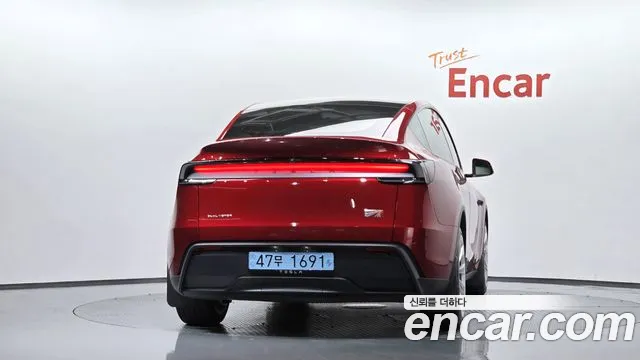 Tesla Model Y — Фото автомобиля 4