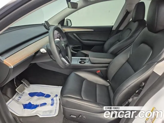 Tesla Model Y — Фото автомобиля 11