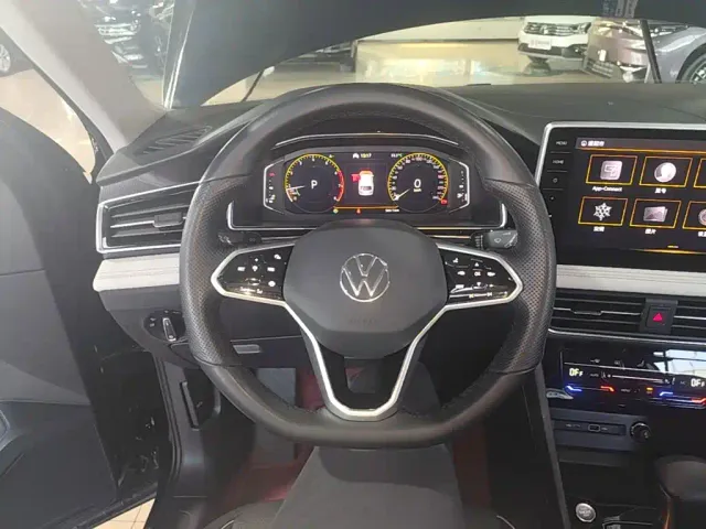 Volkswagen Tiguan L — Фото автомобиля 10