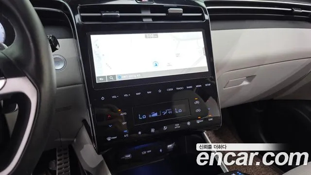 Hyundai Tucson Tucson (NX4) Бензин 1.6 турбо 2WD — Фото автомобиля 12