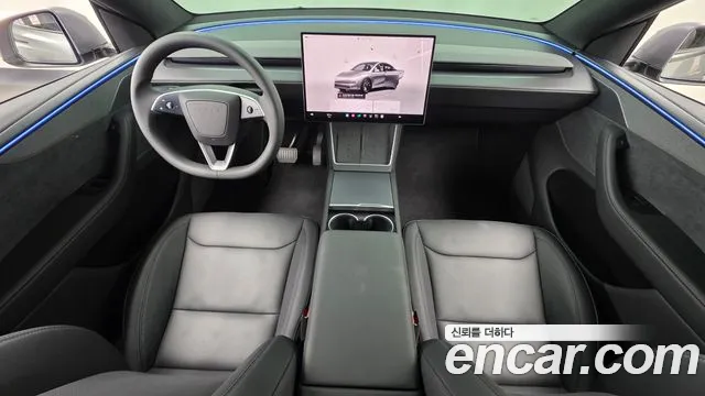 Tesla Model Y — Фото автомобиля 10