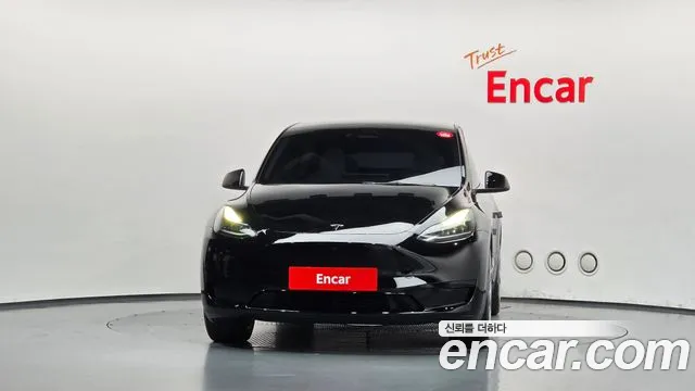 Tesla Model Y — Фото автомобиля 3