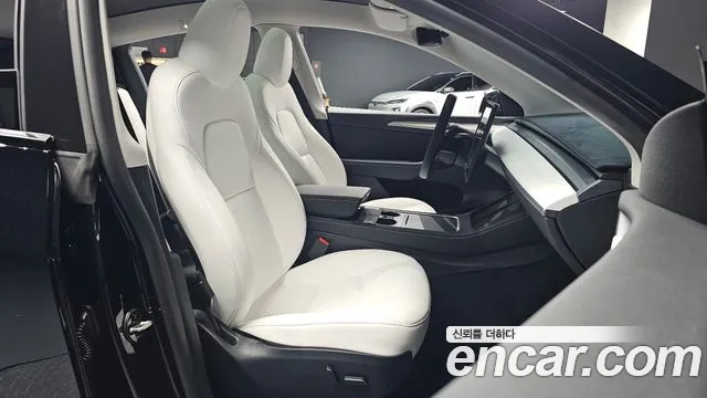 Tesla Model Y — Фото автомобиля 16
