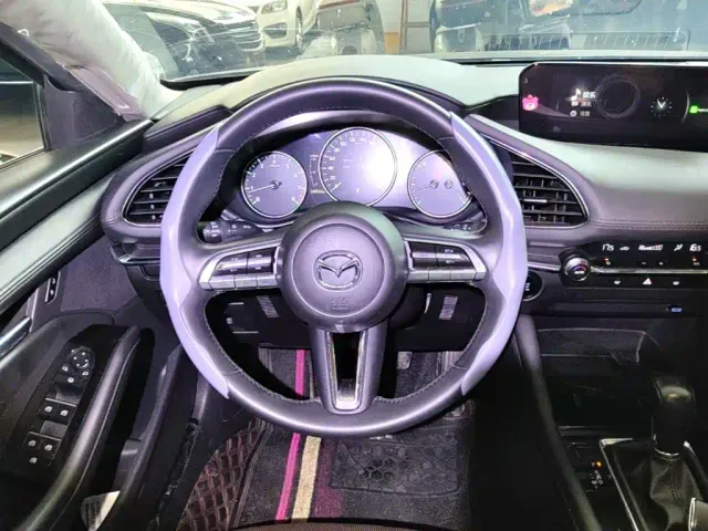Mazda Axela — Фото автомобиля 10
