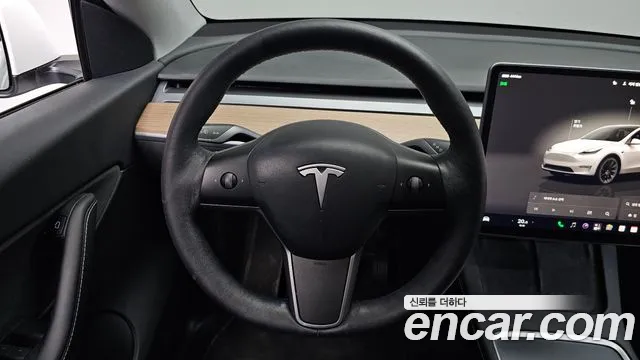 Tesla Model Y — Фото автомобиля 19