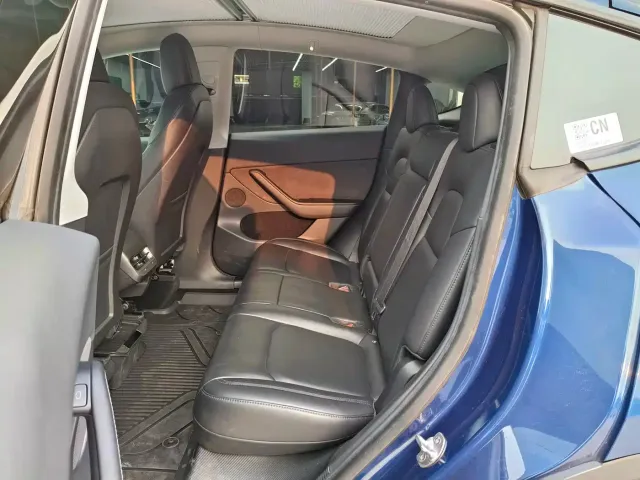 Tesla Model Y — Фото автомобиля 8