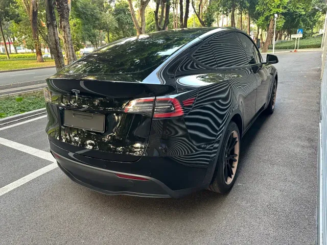 Tesla Model Y — Фото автомобиля 15
