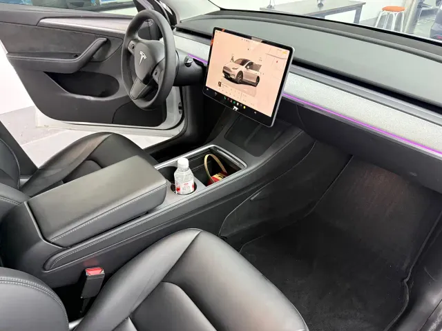 Tesla Model Y — Фото автомобиля 7