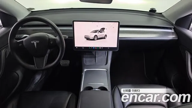 Tesla Model Y — Фото автомобиля 6