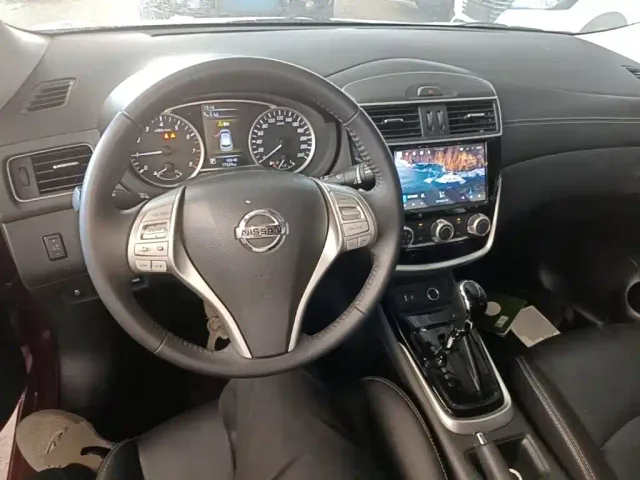 Nissan Tiida — Фото автомобиля 9
