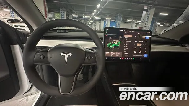 Tesla Model Y — Фото автомобиля 15