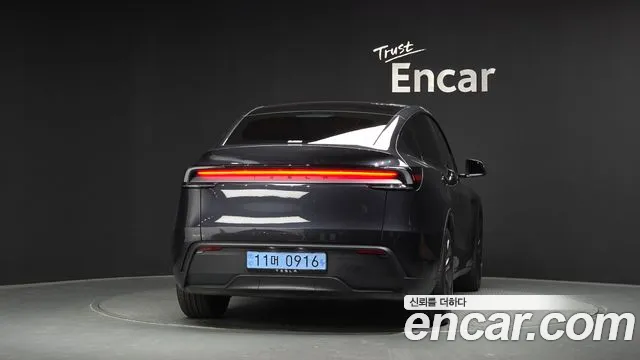 Tesla Model Y — Фото автомобиля 4