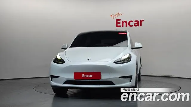 Tesla Model Y — Фото автомобиля 3