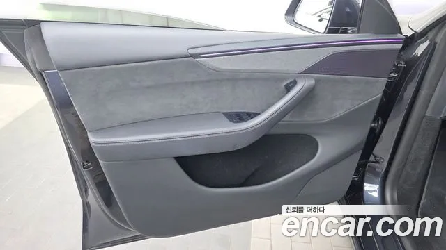 Tesla Model Y — Фото автомобиля 13