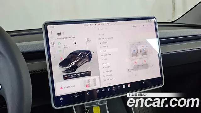 Tesla Model Y — Фото автомобиля 19