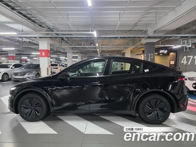 Tesla Model Y — Фото автомобиля 4
