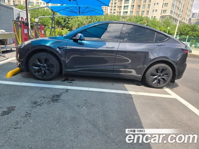 Tesla Model Y — Фото автомобиля 3