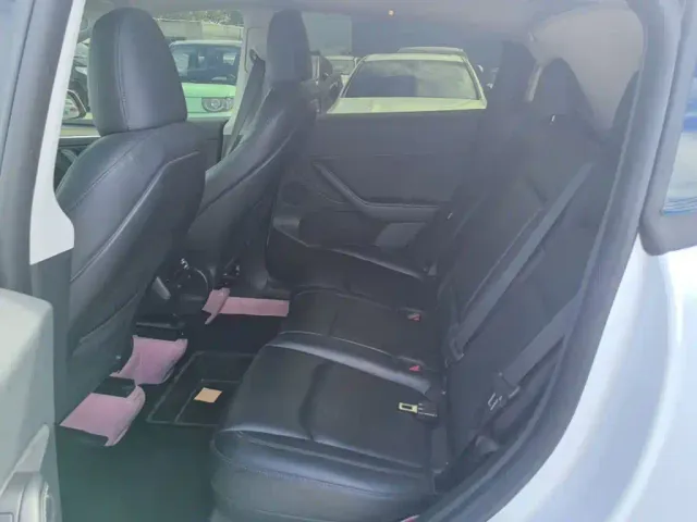 Tesla Model Y — Фото автомобиля 16