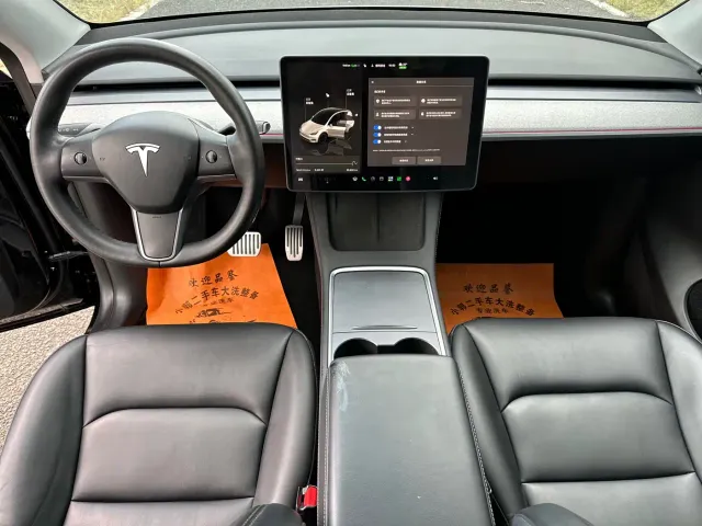 Tesla Model Y — Фото автомобиля 8