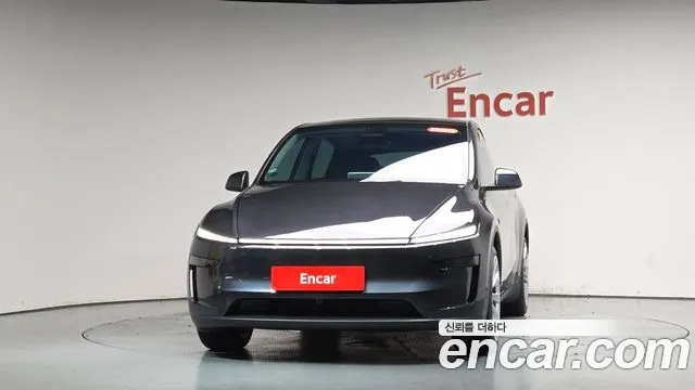 Tesla Model Y — Фото автомобиля 3
