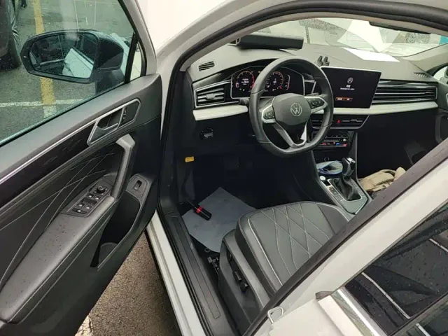 Volkswagen Tiguan L — Фото автомобиля 15