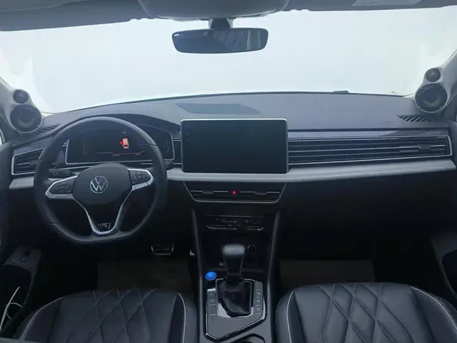 Volkswagen Tiguan L — Фото автомобиля 12