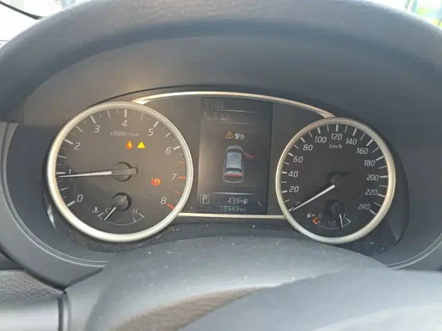 Nissan Tiida — Фото автомобиля 11