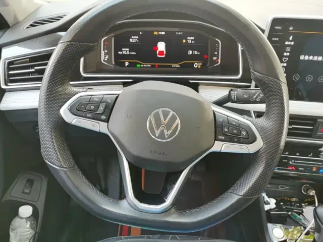 Volkswagen Tiguan L — Фото автомобиля 10