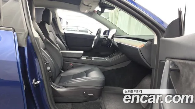 Tesla Model Y — Фото автомобиля 17