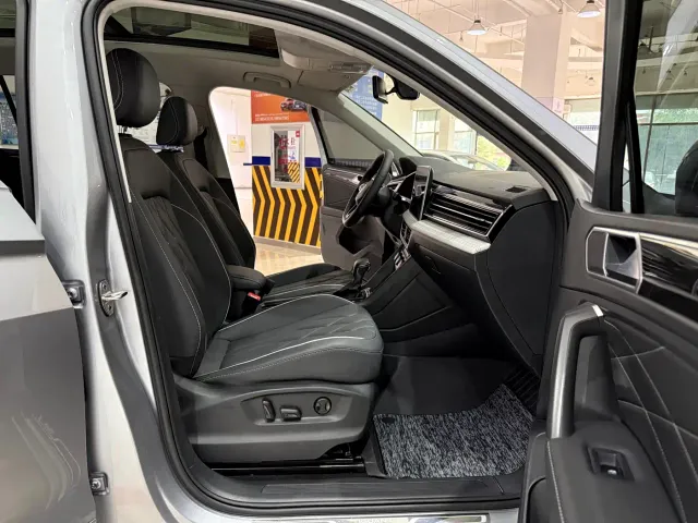 Volkswagen Tiguan L — Фото автомобиля 11