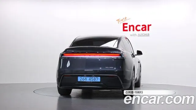 Tesla Model Y — Фото автомобиля 4