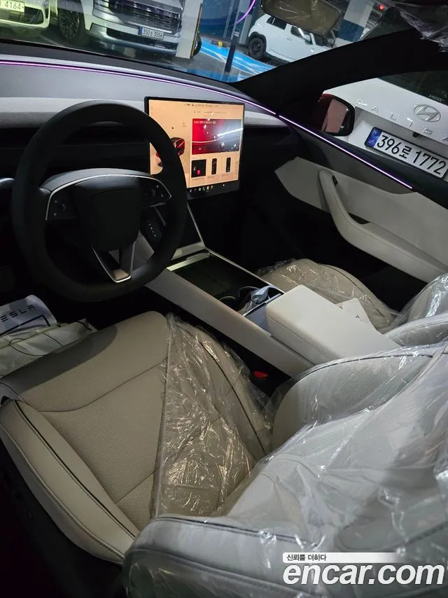Tesla Model Y — Фото автомобиля 10