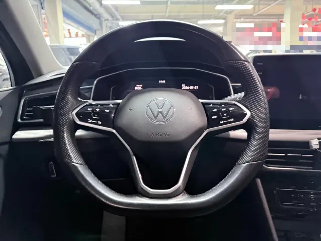 Volkswagen Tiguan L — Фото автомобиля 11