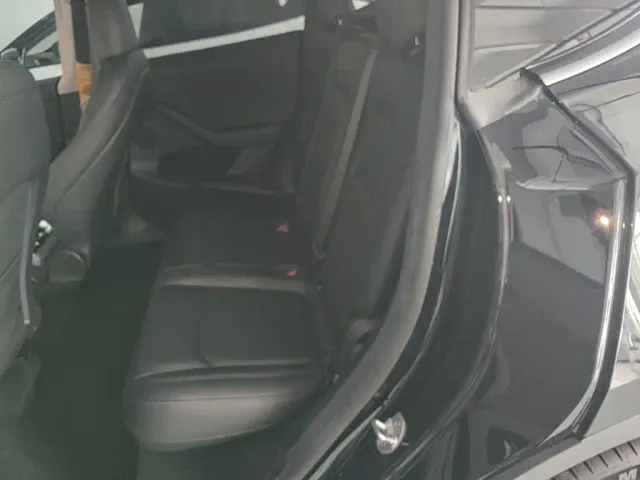 Tesla Model Y — Фото автомобиля 16
